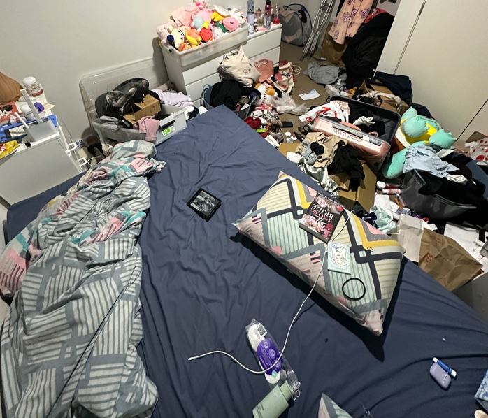cluttered bedroom