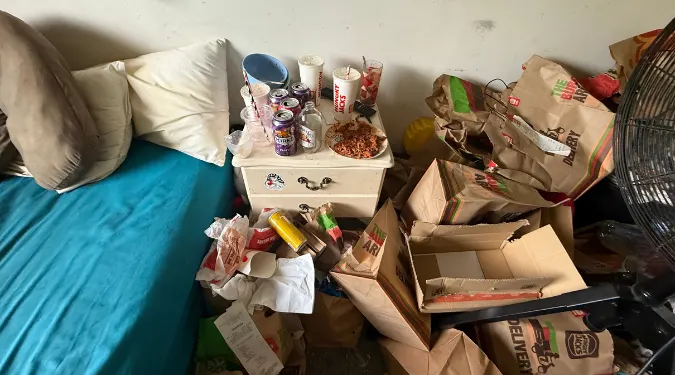 cluttered untidy bedroom